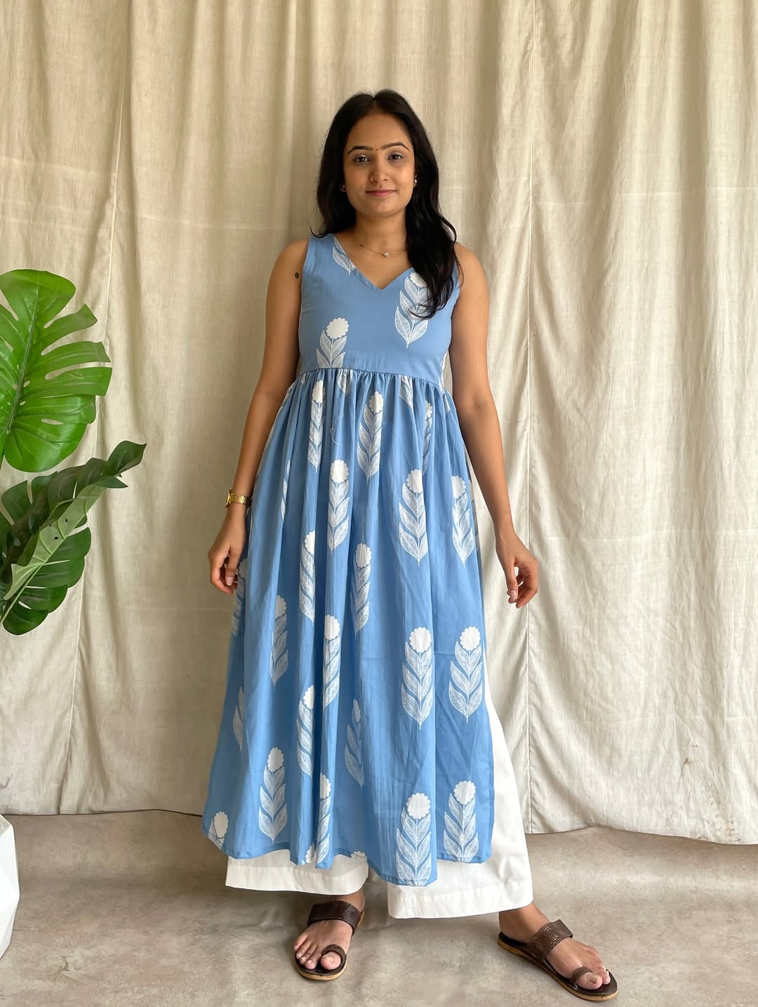 Sky‑Blue Sleeveless Dress with White Floral Pant