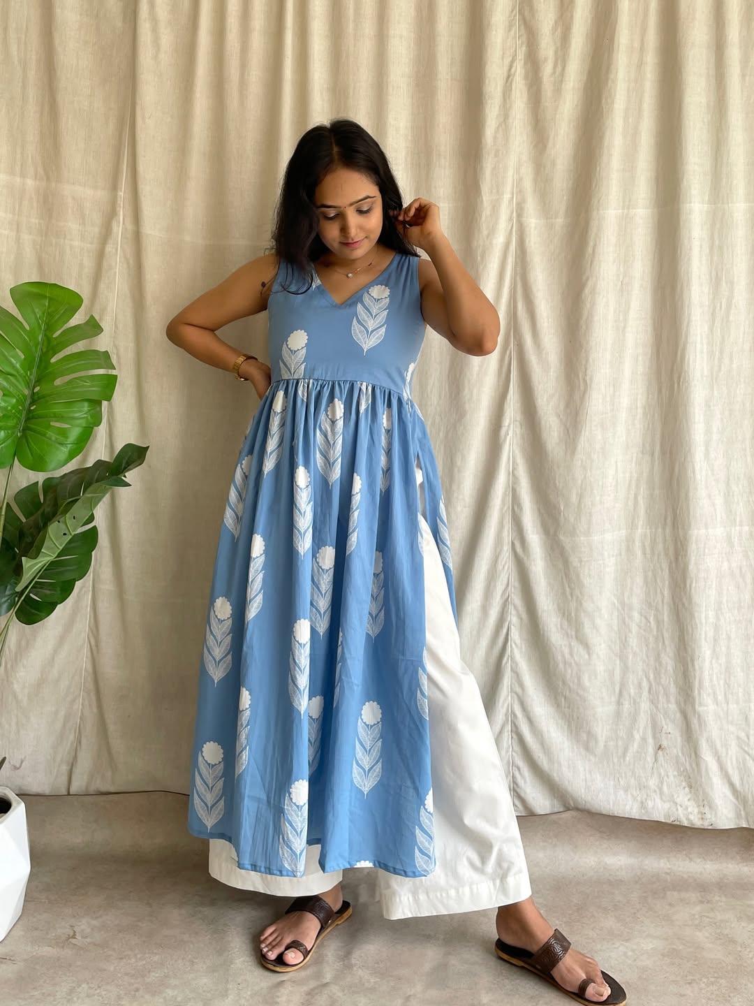 Sky‑Blue Sleeveless Dress with White Floral Pant