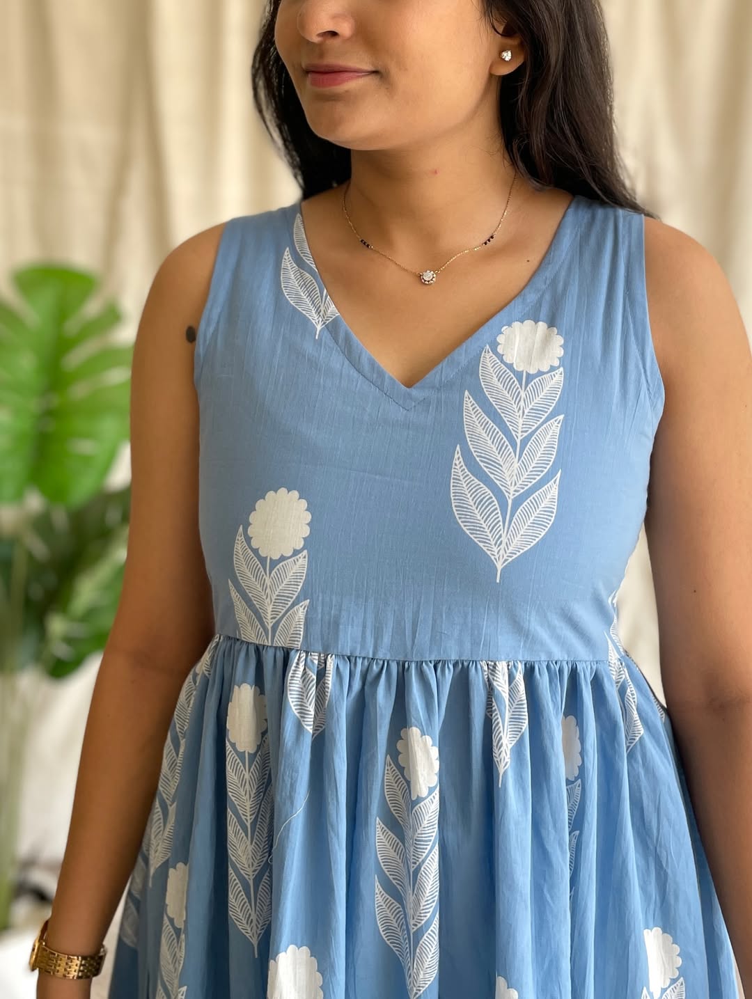 Sky‑Blue Sleeveless Dress with White Floral Pant