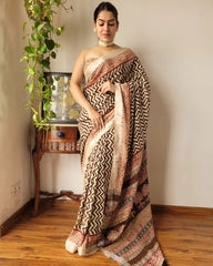 CREAM LINEN SAREE WITH SILVER ZARI BORDER