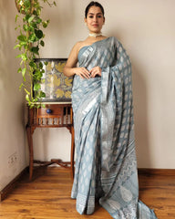 GREY LINEN SAREE WITH SILVER ZARI BORDER