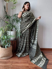 GREY LINEN SAREE WITH SILVER ZARI BORDER