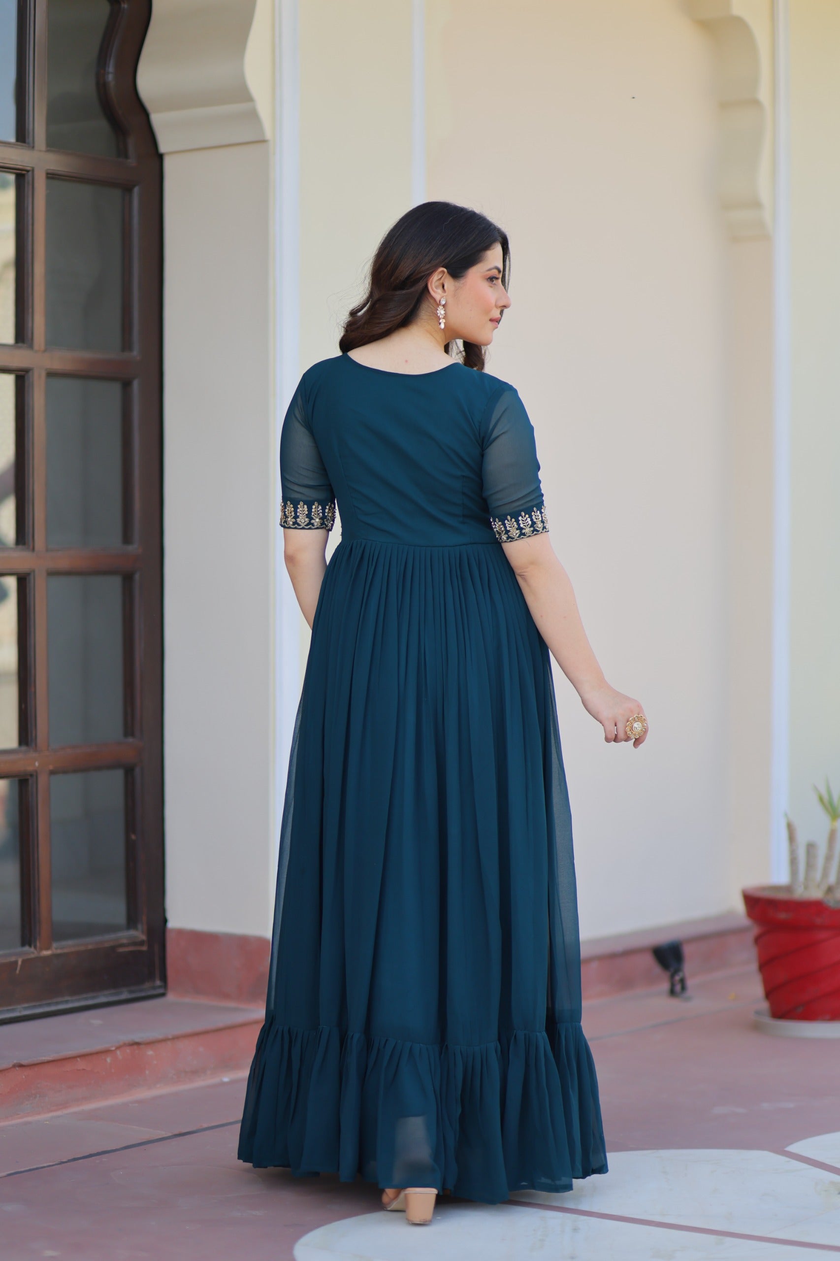 Teal Zari With Embroidered Work Gown