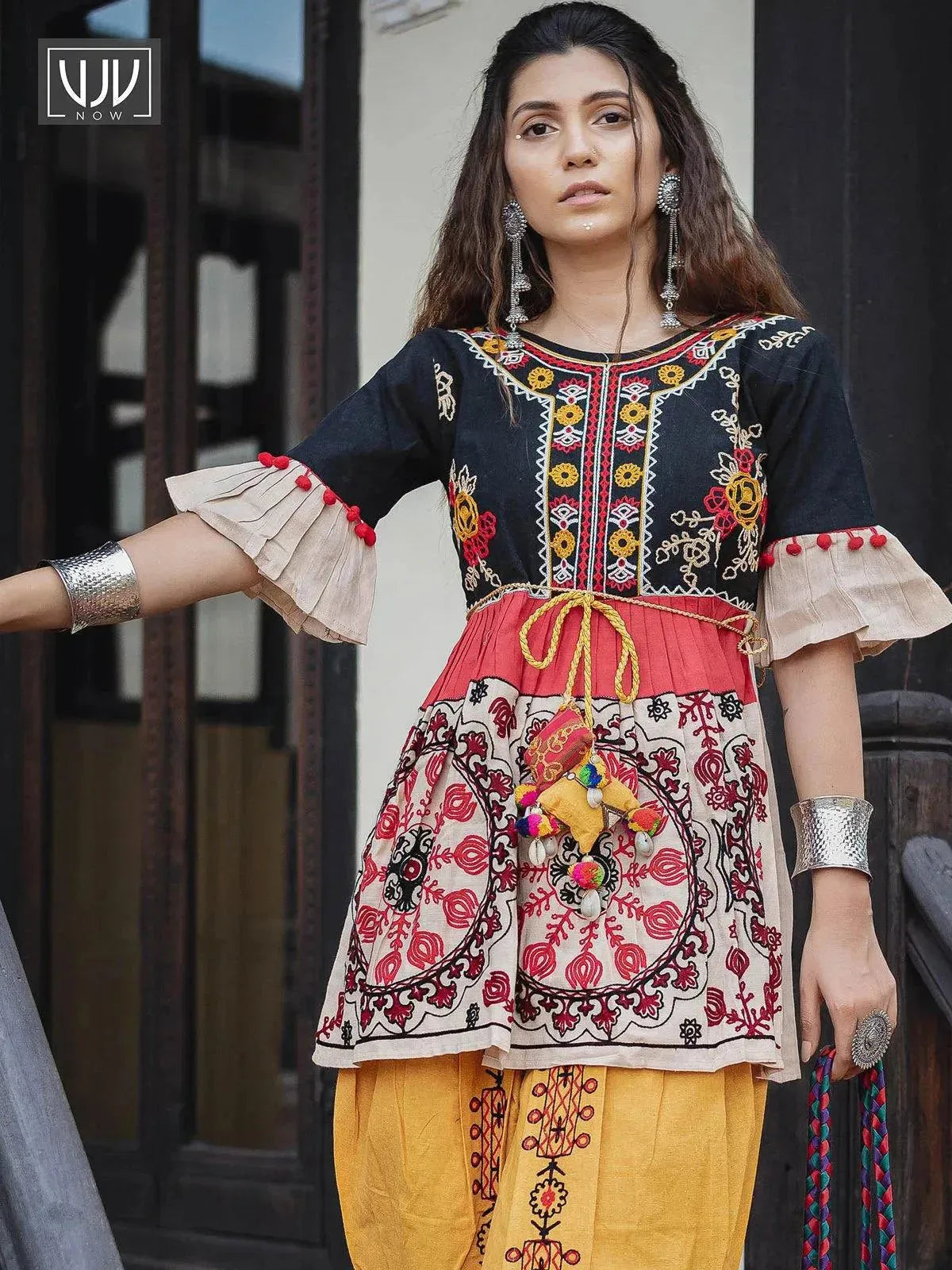 Black and beige circular embroidered kedia with yellow tulip pant