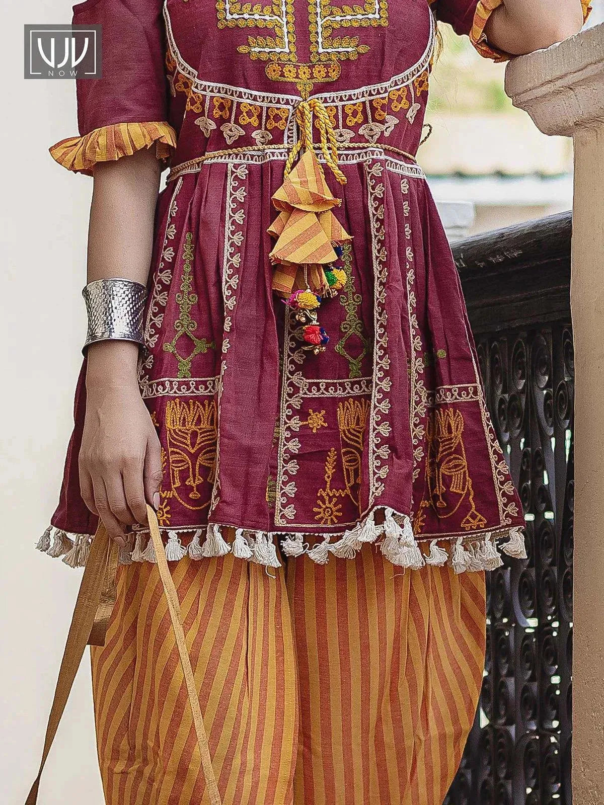 Deep wine foke motif embroidered kedia with yellow striped tulip pant