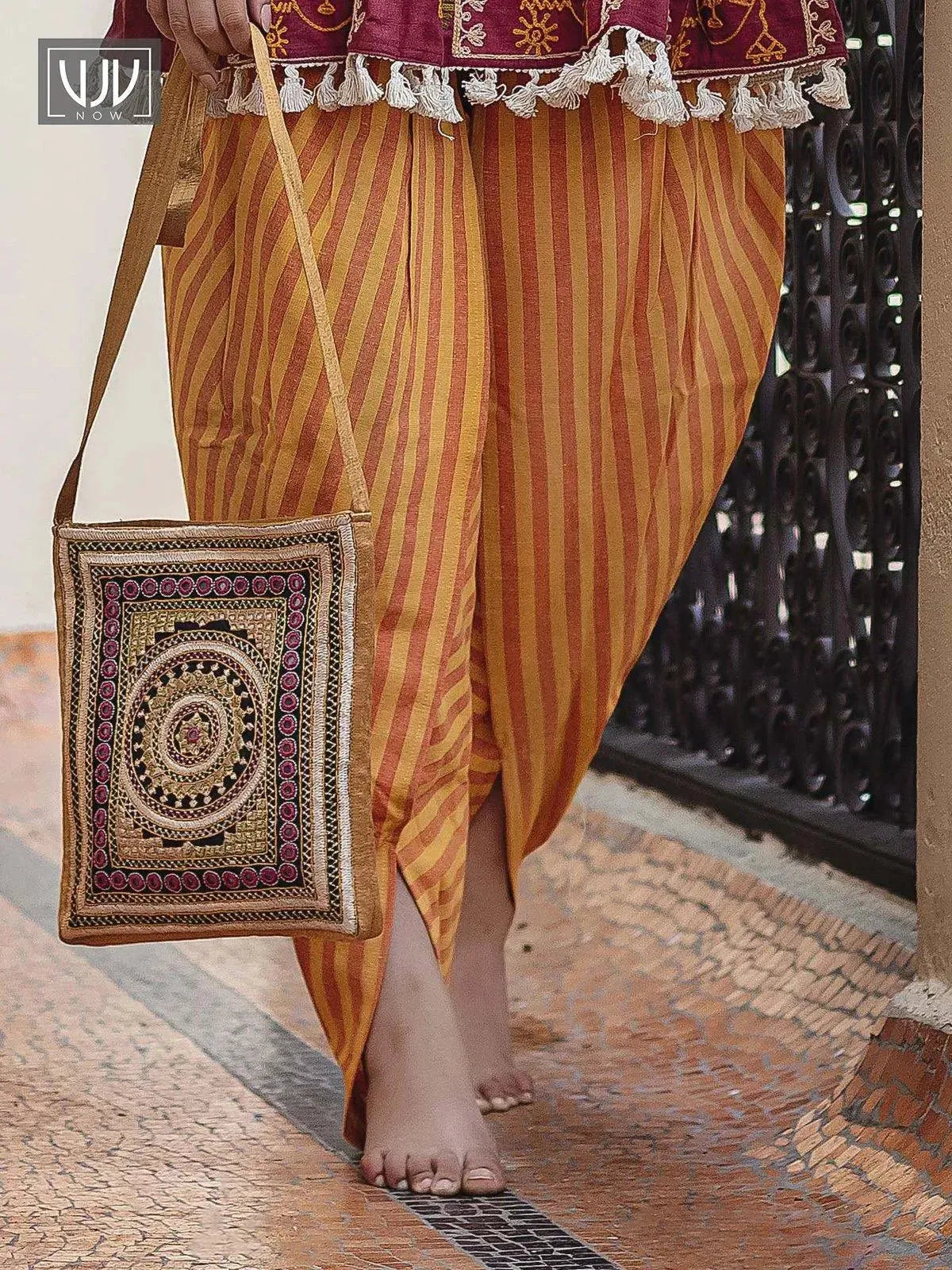 Deep wine foke motif embroidered kedia with yellow striped tulip pant