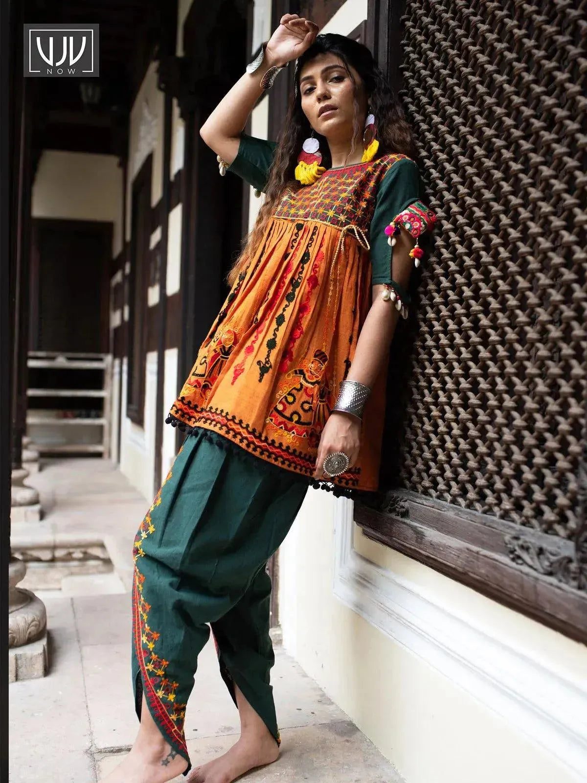 Deep green and orange rajathani dhingli couple embroidered kedia and tulip pants set