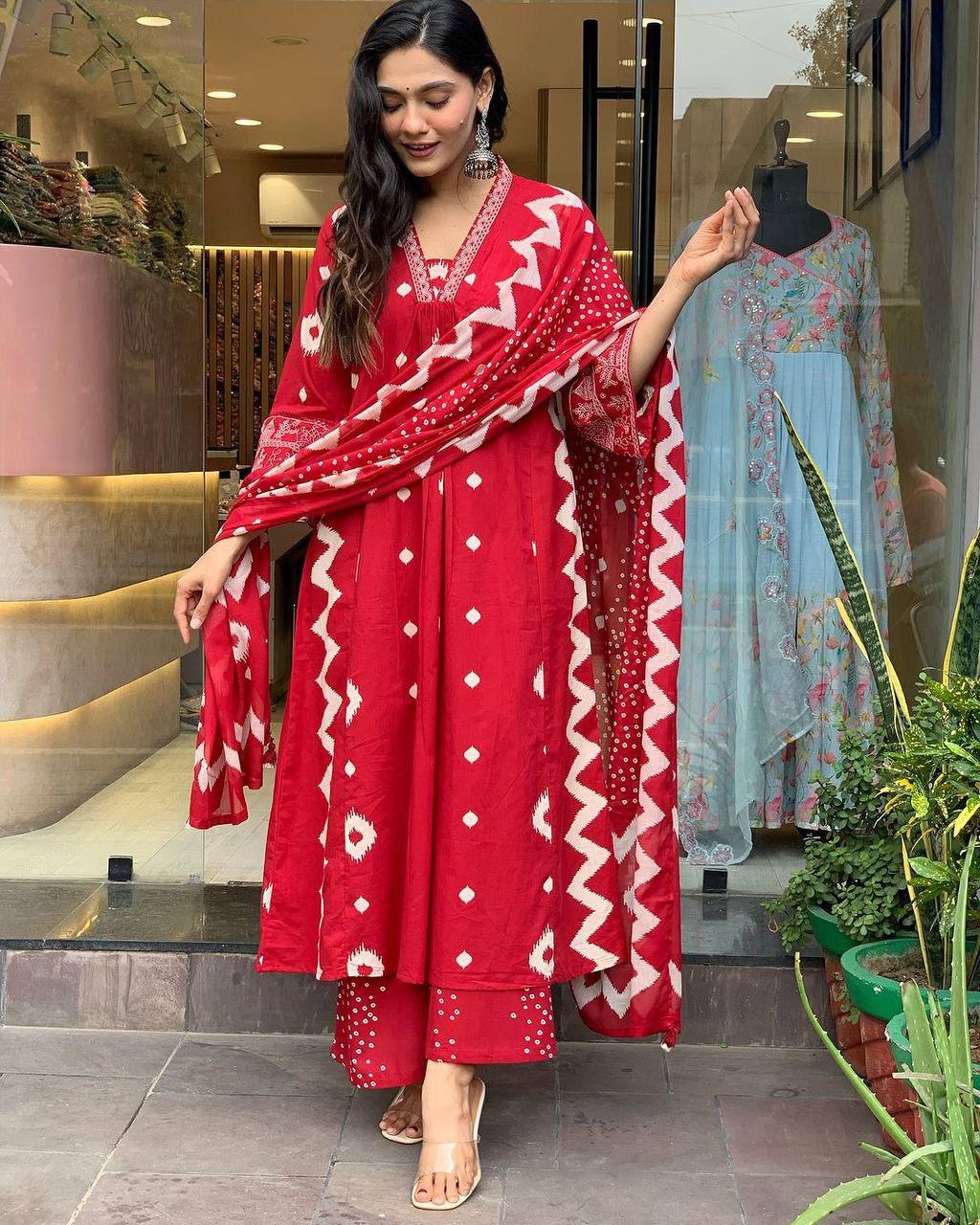 Heavy Suit Set which is beautifully decorated with intricate hand embroidery, Zari weaving .