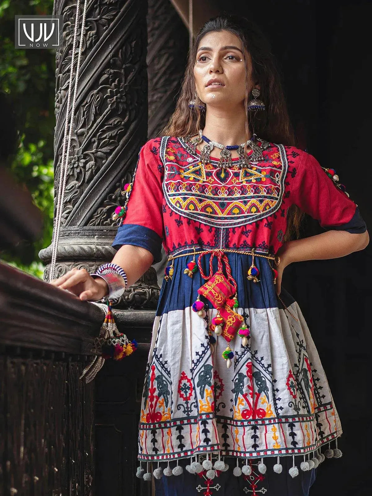 Red yoke and Parrot motif panel embroidered kedia and navy blue tulip pants set