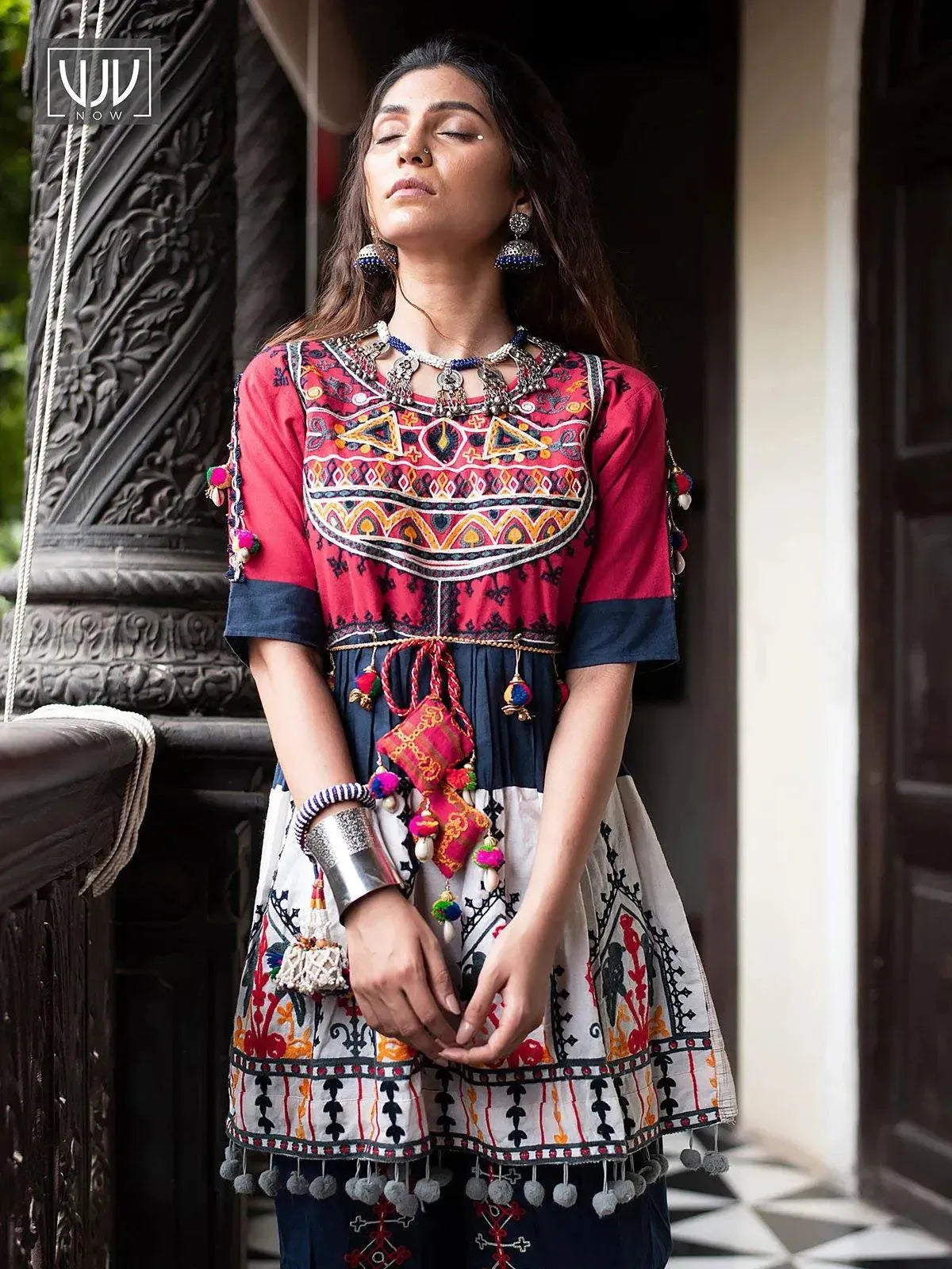 Red yoke and Parrot motif panel embroidered kedia and navy blue tulip pants set